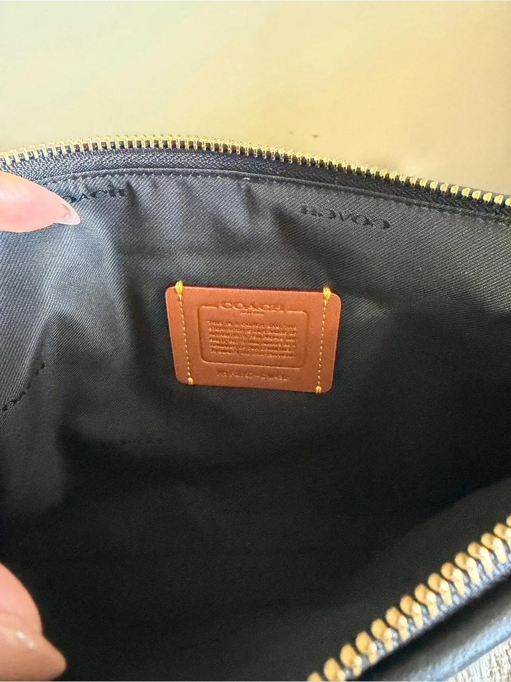 Coach Black Quilted Leather Zip Pouch with Gold Accent